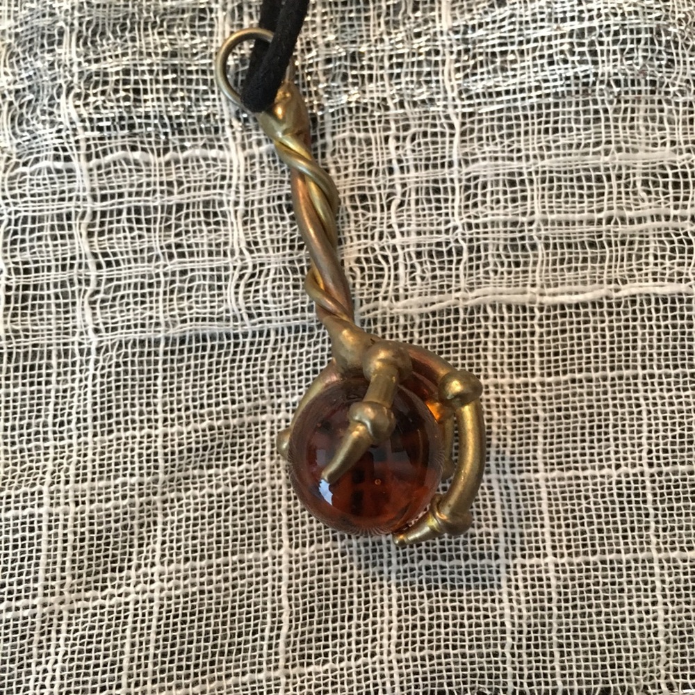 Dragon claw pendant purchased at Renaissance Fair